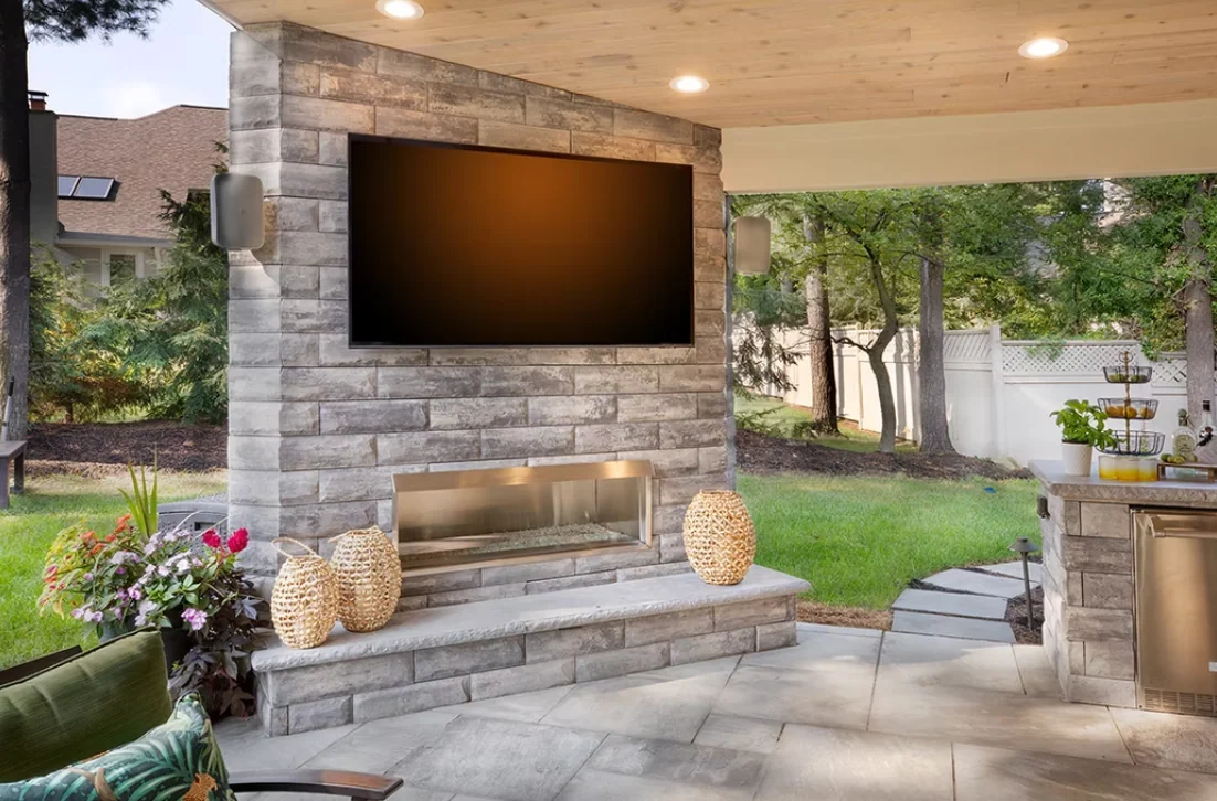 Custom concrete driveway and outdoor living space by Maxima Concrete in Ohio